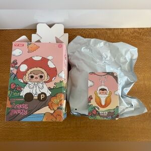 Confirmed “Forest Baby” from Pop Mart Forest Party Pucky Plush Pendant series.